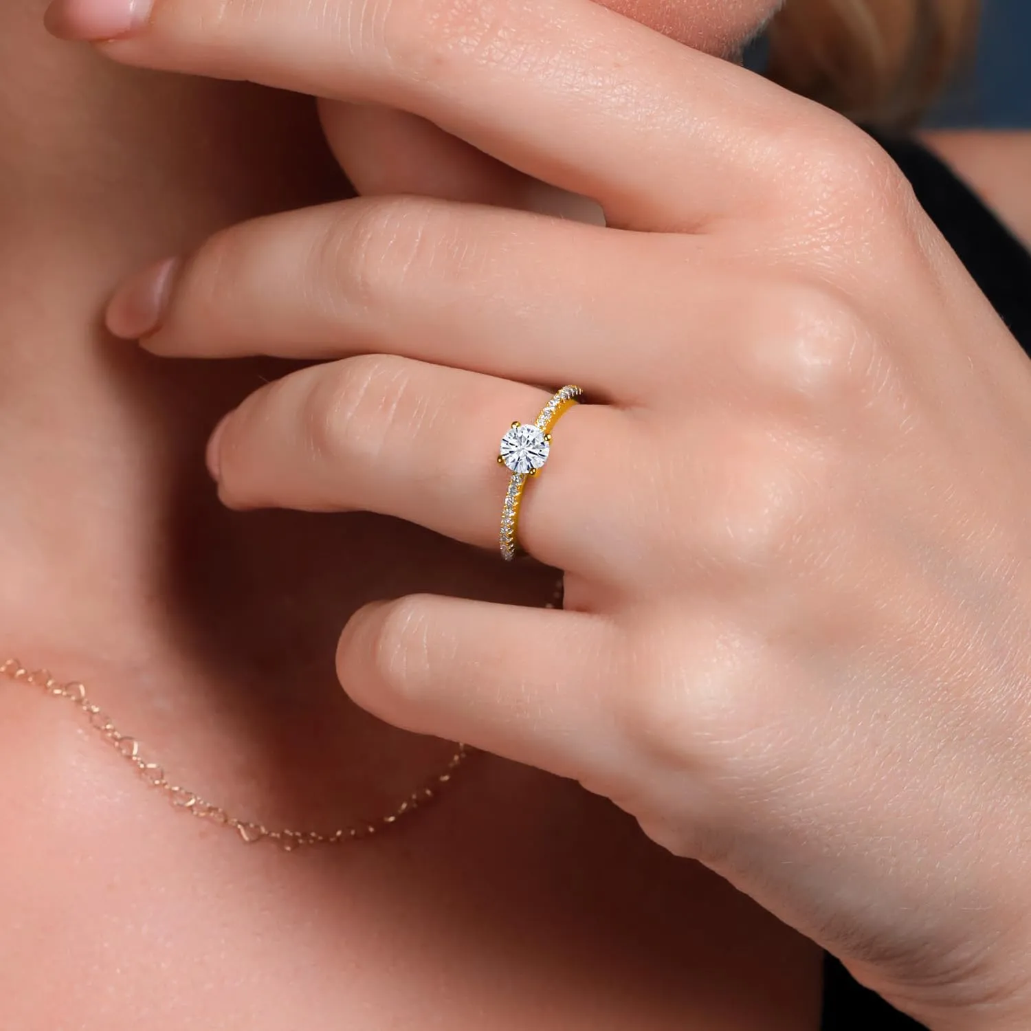 Gem Stone King 18K Rose Gold Plated Silver White Moissanite and White Lab Grown Diamond Engagement Wedding Anniversary Ring For Women (0.59 Cttw, Round 5MM, Available In Size 5, 6, 7, 8, 9)